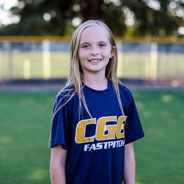 Isabella Hampton, a CGG FASTPITCH softball athlete, running the bases with determination.